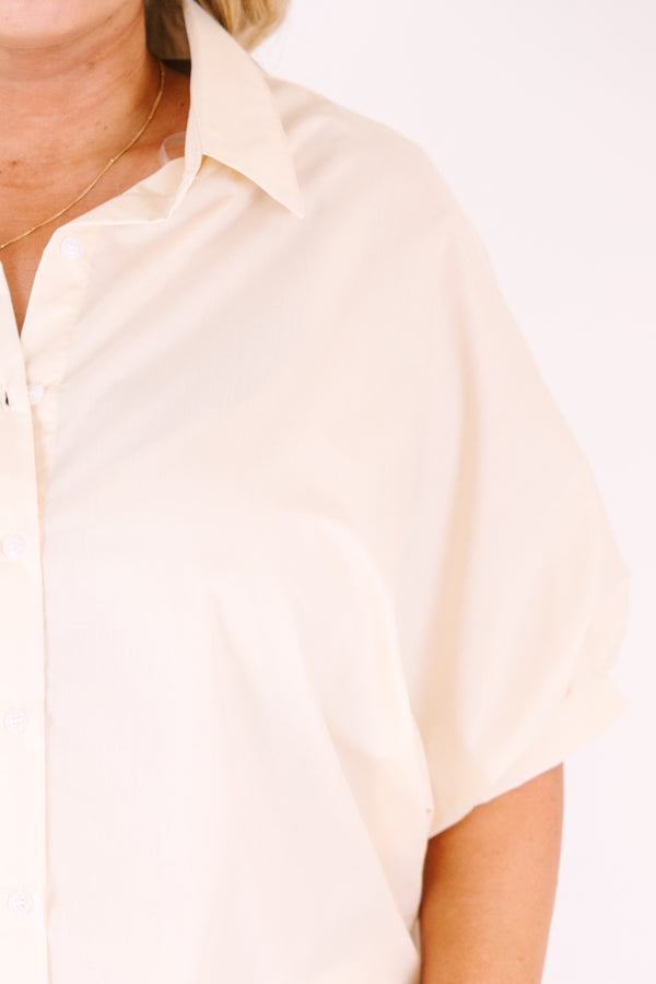 Chic Soul plus size clothing, tan button-up top with short sleeves that have cuffs on each end of the sleeves as well as a collar detail 