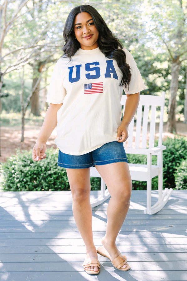 Chic Soul plus size clothing, white short sleeve tee with USA in navy block varsity style font with an American flag graphic below it