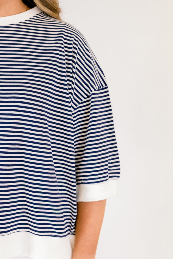 Chic Soul plus size clothing, navy striped short sleeve tee with white outlining the end of the sleeves along the neckline and on the bottom of the top 