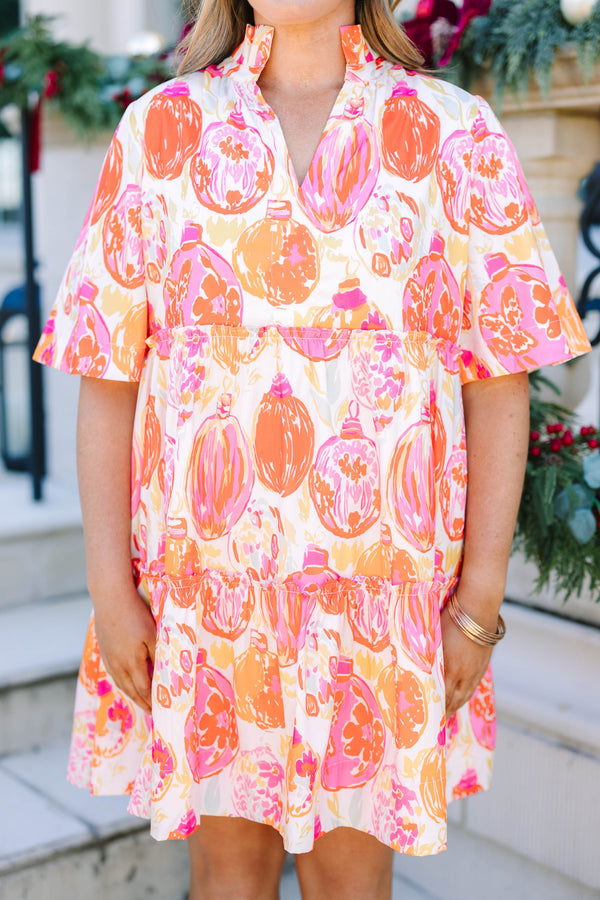 Plus Size short-sleeved tiered mini dress with a colorful pink and orange ornament print.