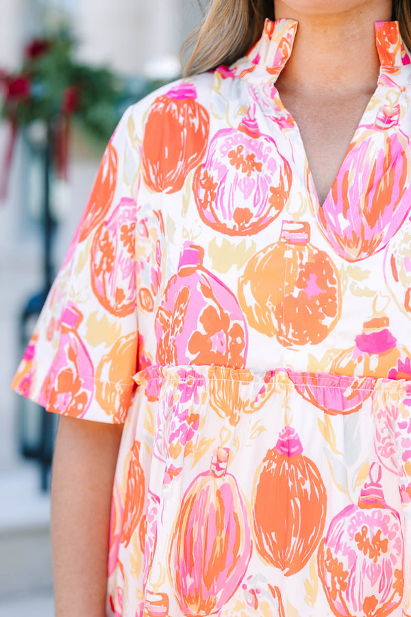 Plus Size short-sleeved tiered mini dress with a colorful pink and orange ornament print.
