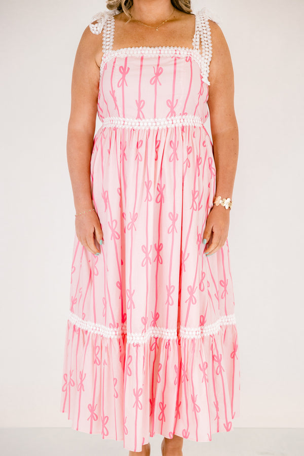 Chic Soul plus size clothing, light pink tiered maxi dress with dark pink bow pattern and white lacy ribbon trim and tie straps