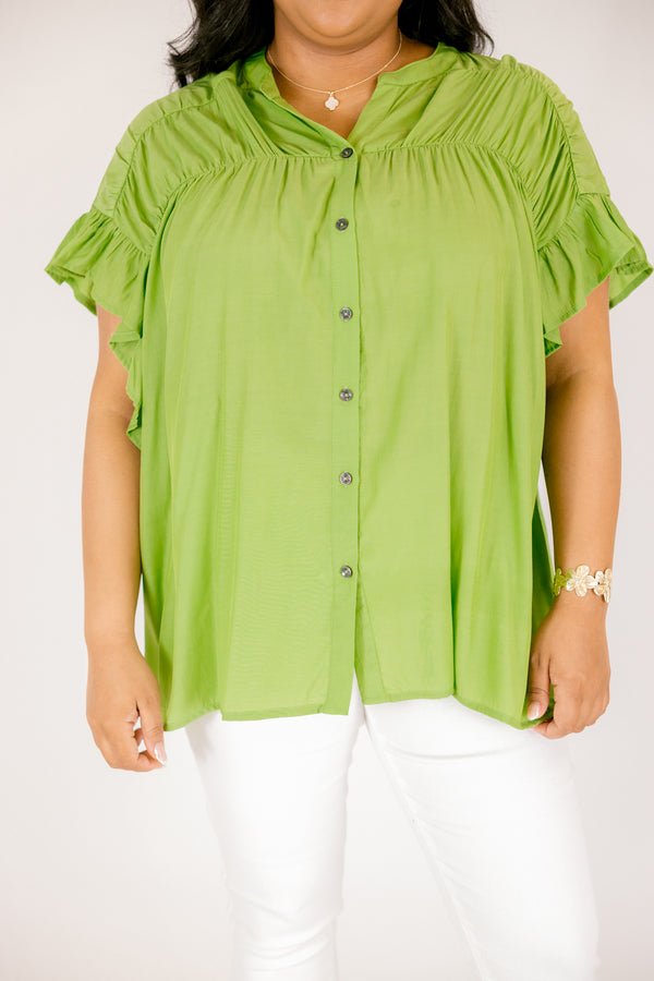 Chic Soul plus size clothing, green top with flutter sleeves and  buttons going down the center of the top as well a sinched detailing on the shoulder area of the top