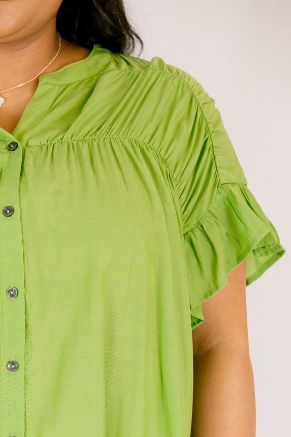 Chic Soul plus size clothing, green top with flutter sleeves and  buttons going down the center of the top as well a sinched detailing on the shoulder area of the top