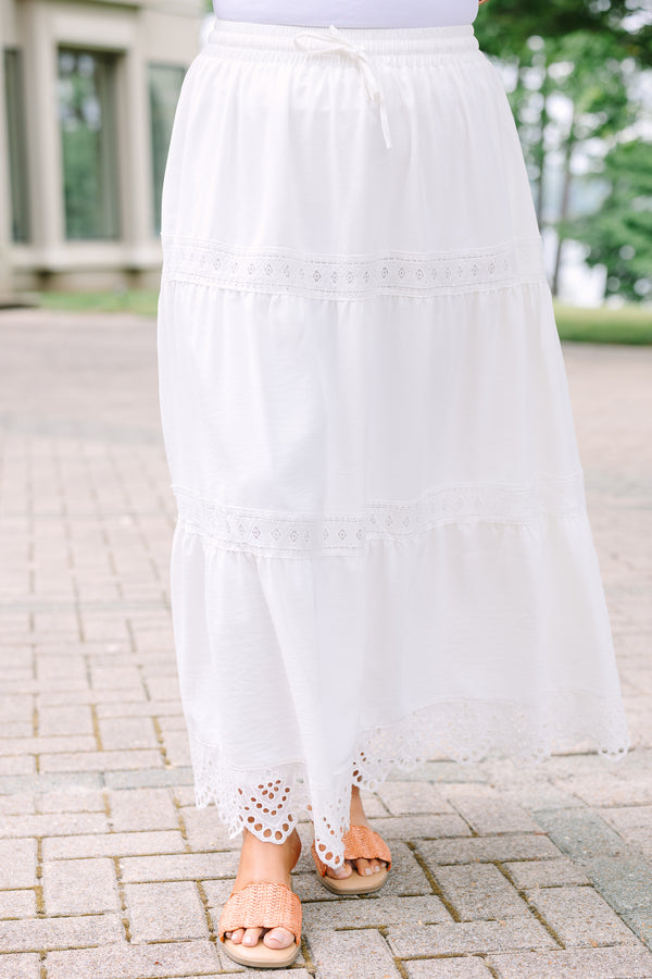 Plus Size white tiered maxi skirt with lace trim, eyelet hem, and drawstring waist.