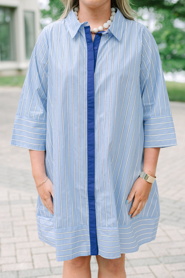 Plus size blue and white striped cotton shirt dress with three-quarter sleeves and a navy button placket.