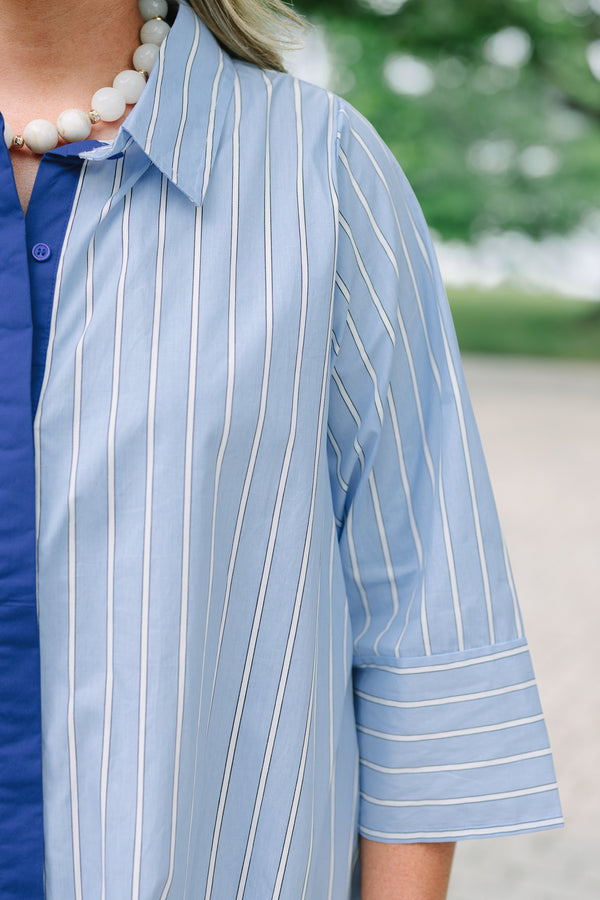 Plus size blue and white striped cotton shirt dress with three-quarter sleeves and a navy button placket.