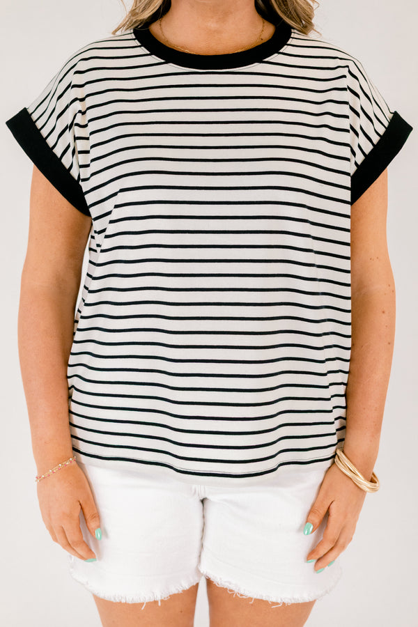Chic Soul plus size clothing, cream short sleeve tee with black stripes as well as black cuffs at the end of each sleeve and black outlining the neckline of the tee 
