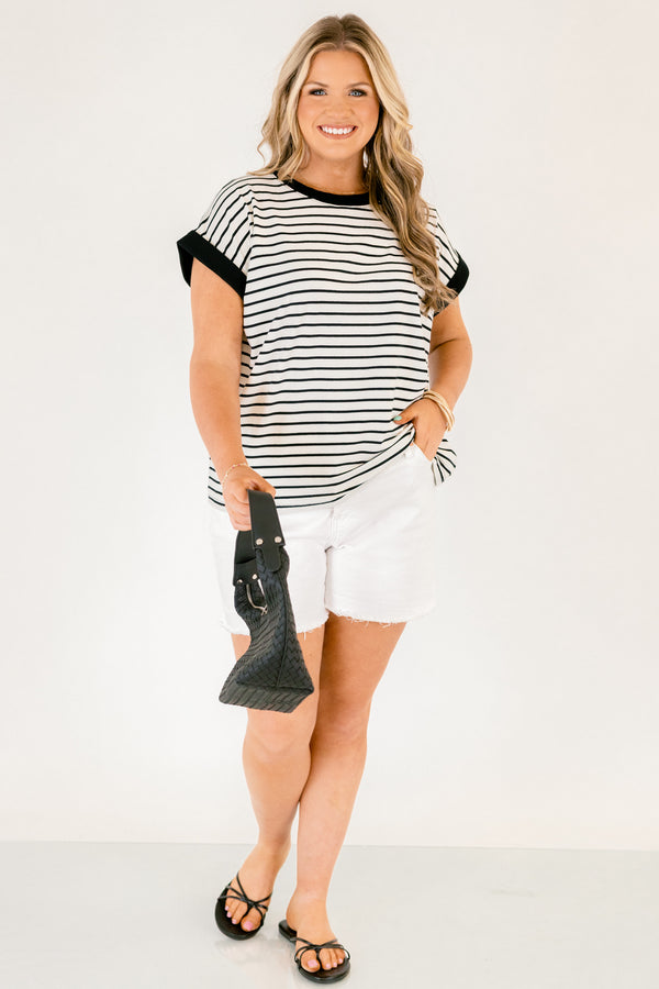 Chic Soul plus size clothing, cream short sleeve tee with black stripes as well as black cuffs at the end of each sleeve and black outlining the neckline of the tee 
