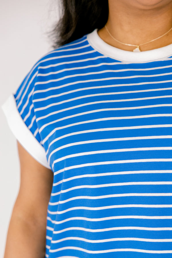Chic Soul plus size clothing, ocean blue striped short sleeve tee with white outlining the end of the sleeves and around the neckline 
