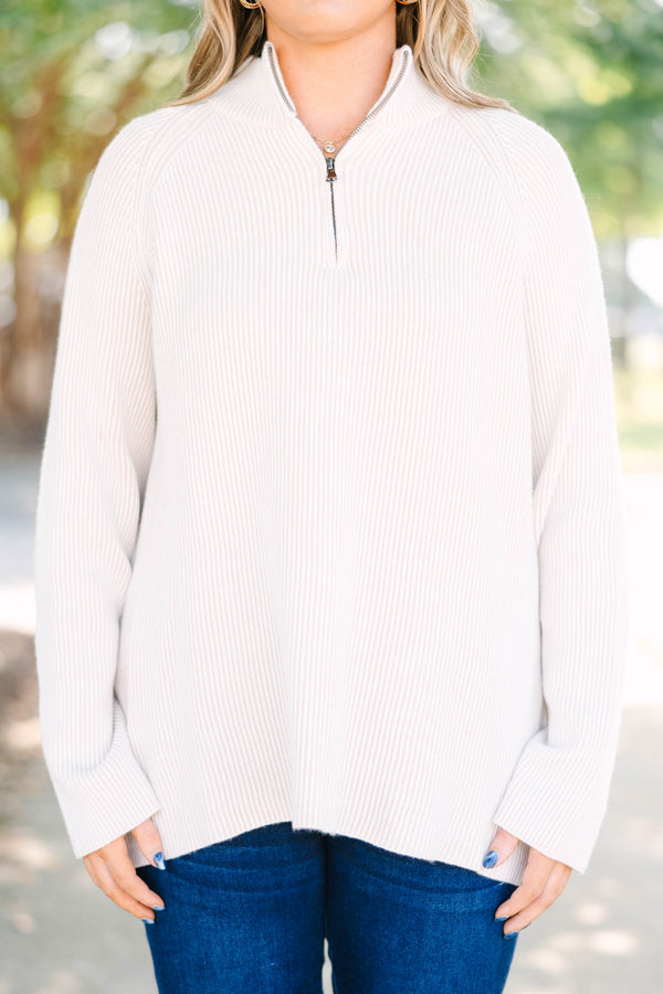Plus size cream ribbed quarter-zip sweater with a cozy, relaxed fit and long sleeves.
