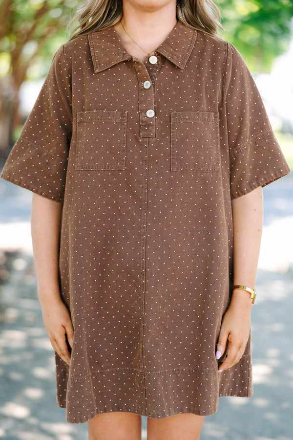 Plus Size brown short sleeve polo dress with white polka dots, collar, and front pockets.