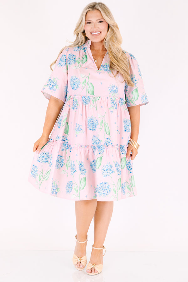 Chic Soul plus size clothing, pink tiered dress with short sleeves a slight v-neckline and a green and blue hydrangea pattern throughout 