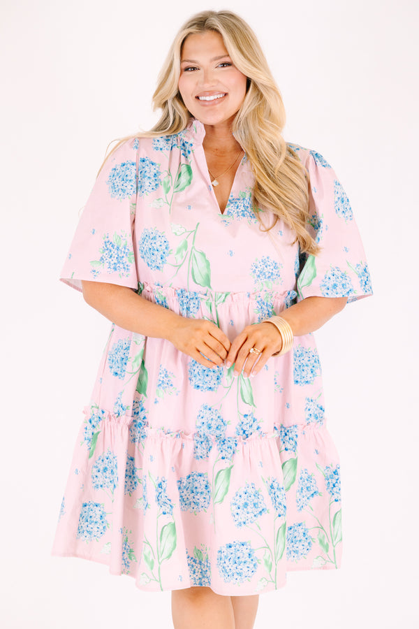 Chic Soul plus size clothing, pink tiered dress with short sleeves a slight v-neckline and a green and blue hydrangea pattern throughout 