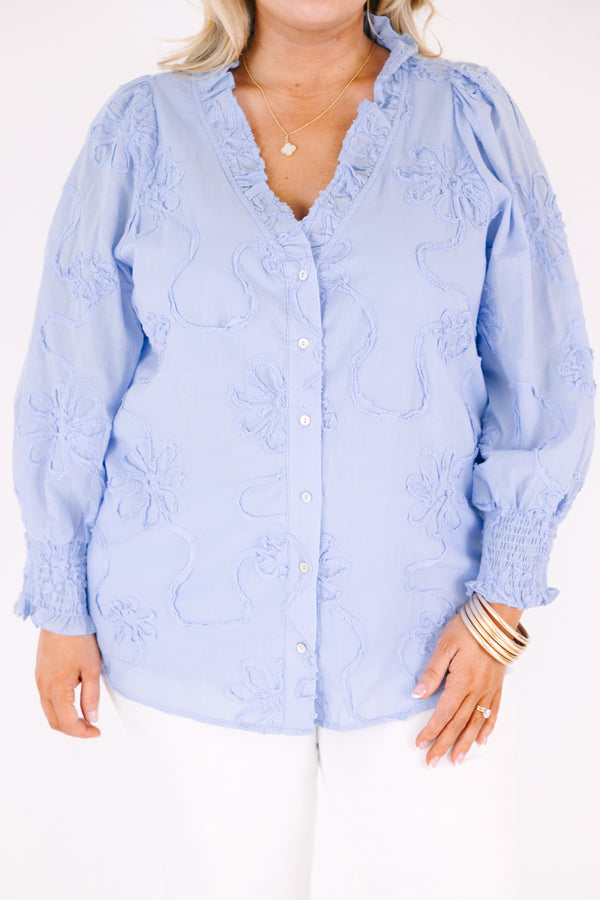 Chic Soul plus size clothing, long sleeve blue top with a deep v-neckline and textured floral pattern throughout as well a cinching at the bottom of the sleeves 