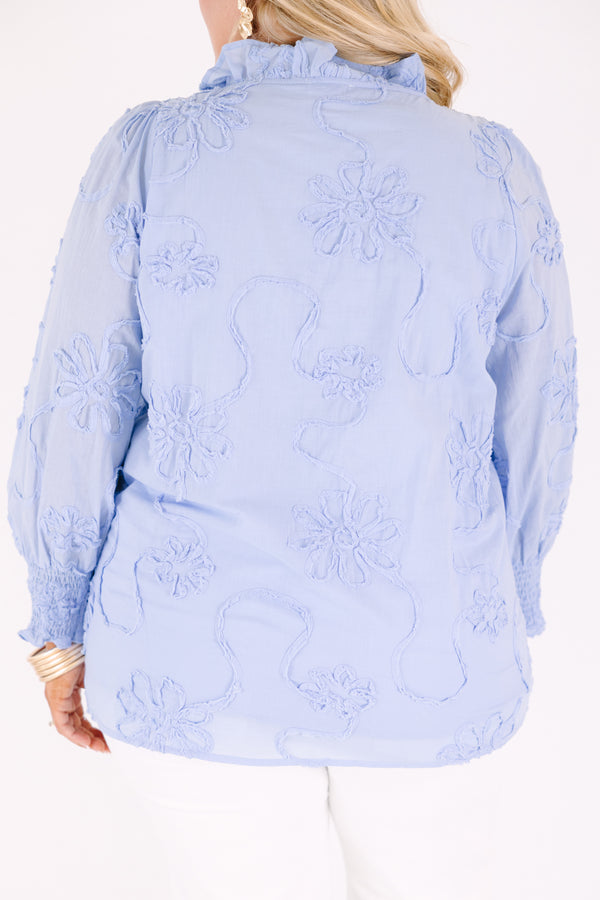 Chic Soul plus size clothing, long sleeve blue top with a deep v-neckline and textured floral pattern throughout as well a cinching at the bottom of the sleeves 