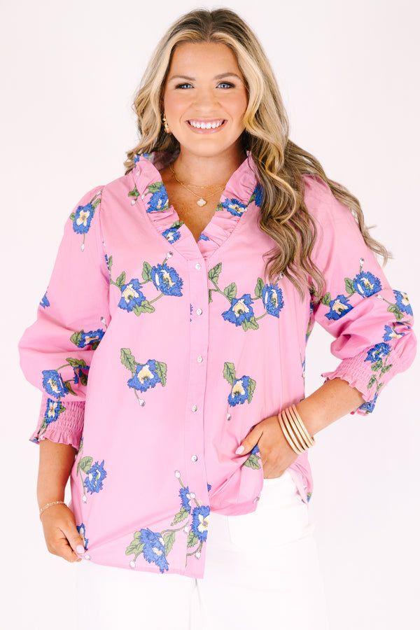 Chic Soul plus size clothing, pink long sleeve button up top with cinching at the sleeves and ruffle collar with blue flowers on it