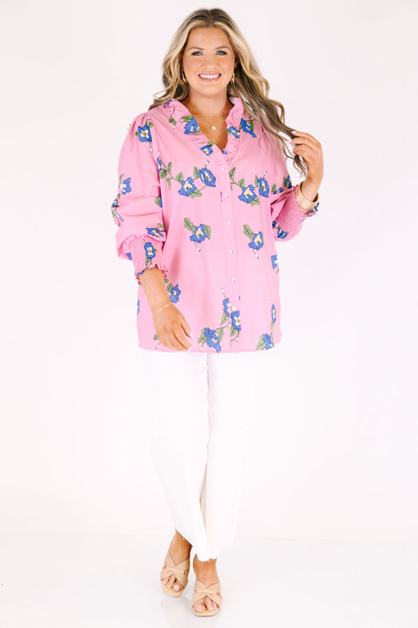 Chic Soul plus size clothing, pink long sleeve button up top with cinching at the sleeves and ruffle collar with blue flowers on it