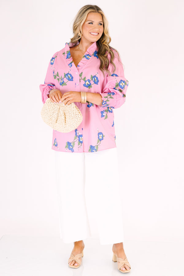 Chic Soul plus size clothing, pink long sleeve button up top with cinching at the sleeves and ruffle collar with blue flowers on it