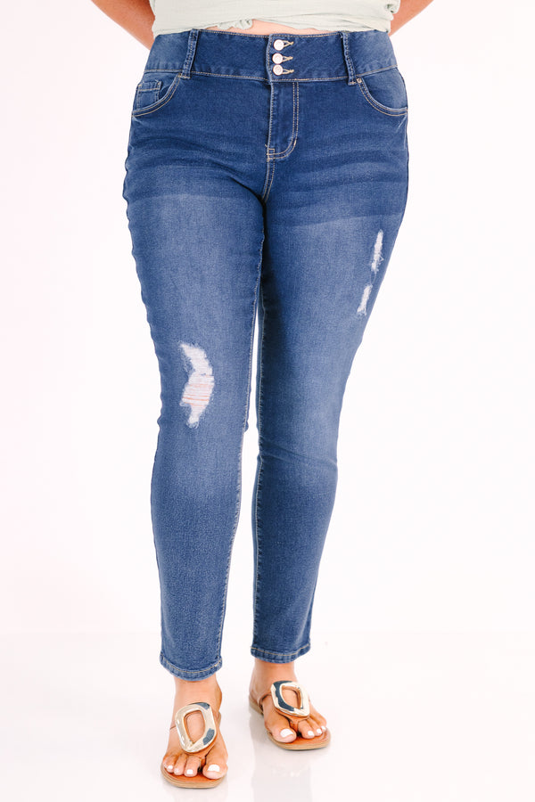 Chic Soul plus size clothing, medium wash skinny jeans with distressed details and a triple-button waist.