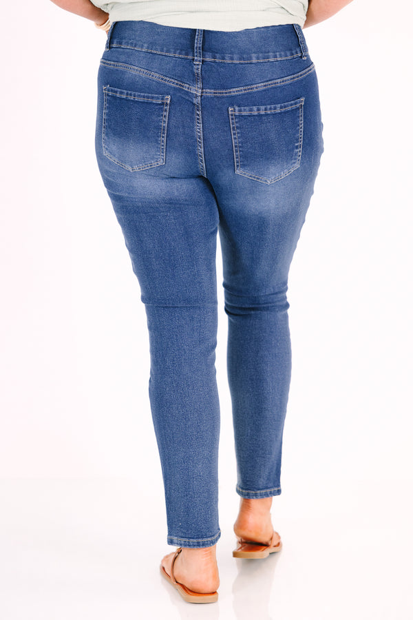 Chic Soul plus size clothing, medium wash skinny jeans with distressed details and a triple-button waist.