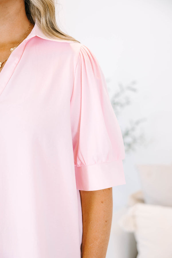 Plus Size powder pink short puff sleeve top with a collared v-neckline.
