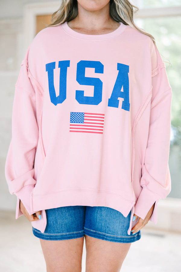 Plus Size dusty pink crew neck sweatshirt with blue USA text and an American flag graphic.