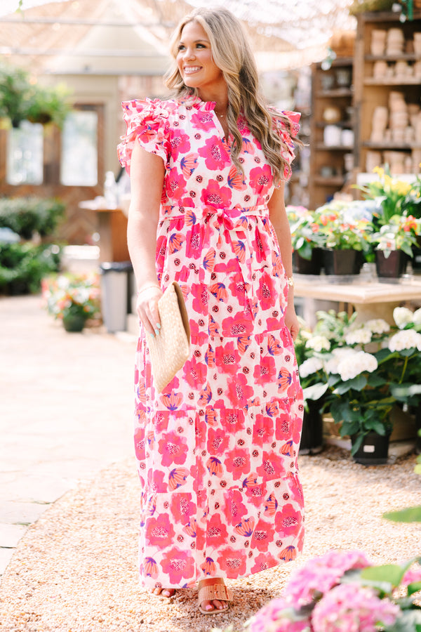 Chic Soul plus size clothing, pink floral maxi dress with flutter sleeve and a belt that ties in a bow that goes around the waist 