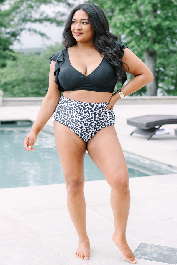 Plus Size high-waisted swim bottoms in a black and white leopard print.