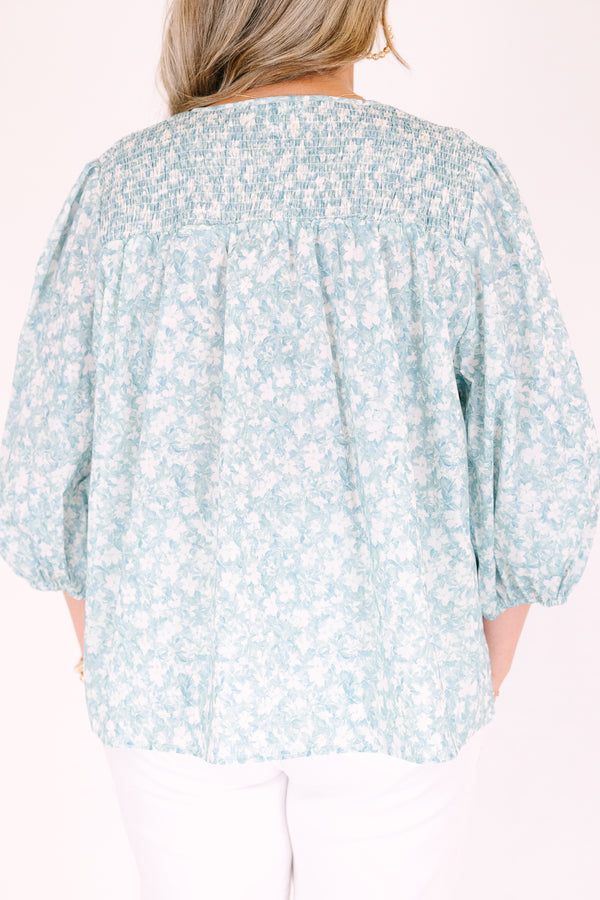 Chic Soul plus size clothing, blue top with half bubble sleeves a small v-neckline and a floral pattern throughout 