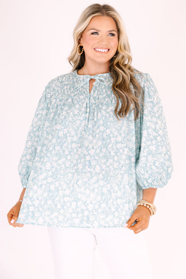 Chic Soul plus size clothing, blue top with half bubble sleeves a small v-neckline and a floral pattern throughout 