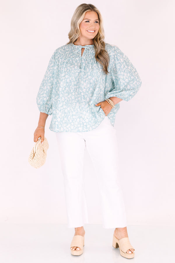 Chic Soul plus size clothing, blue top with half bubble sleeves a small v-neckline and a floral pattern throughout 