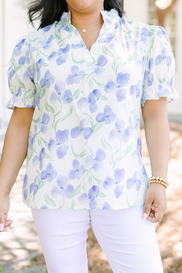 Chic Soul Plus Size Clothing, Blue floral print cotton top with a v-neckline and short bubble sleeves.