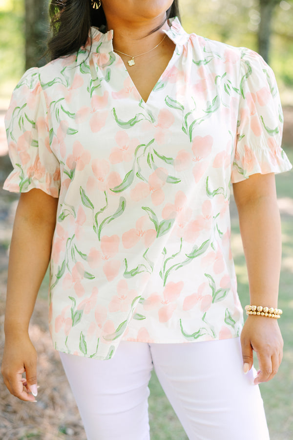 Plus Size pink floral v-neck top with short bubble sleeves 