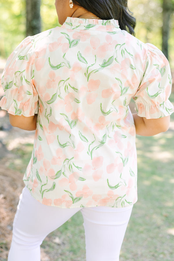 Plus Size pink floral v-neck top with short bubble sleeves 