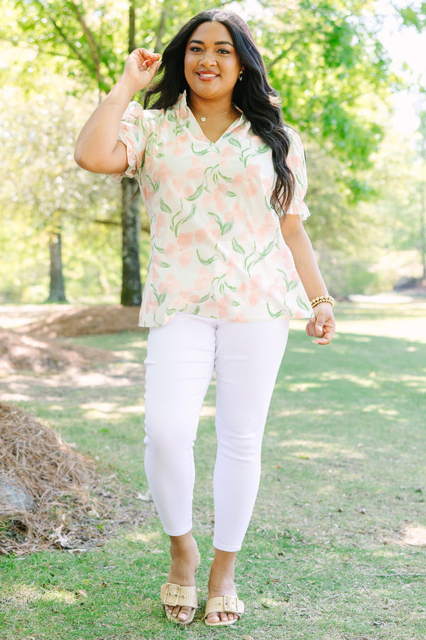 Plus Size pink floral v-neck top with short bubble sleeves 