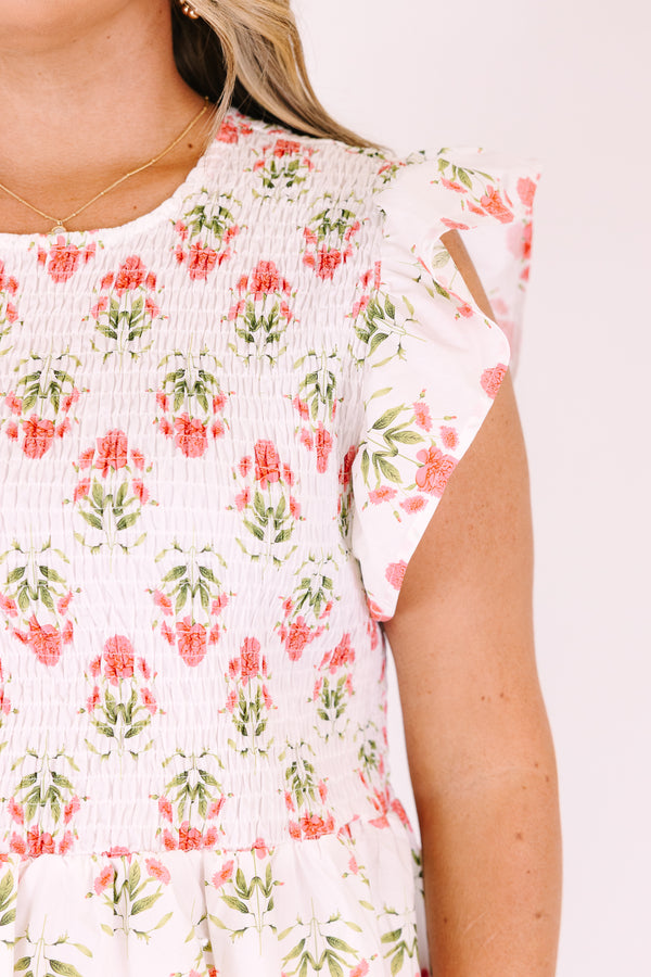 Chic Soul plus size clothing, ivory top with flutter sleeves and a smocked texture on the chest area as well as a pink floral block pattern 