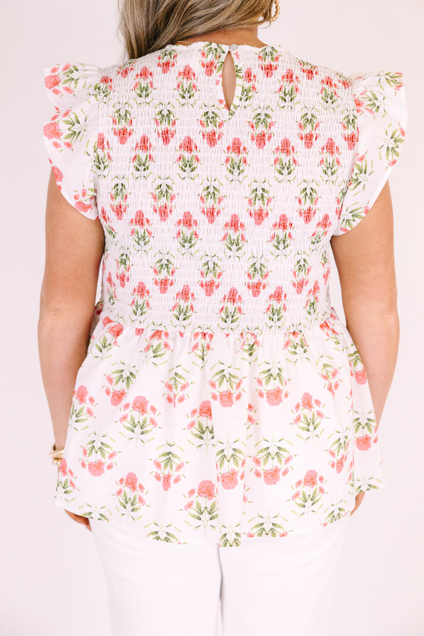 Chic Soul plus size clothing, ivory top with flutter sleeves and a smocked texture on the chest area as well as a pink floral block pattern 