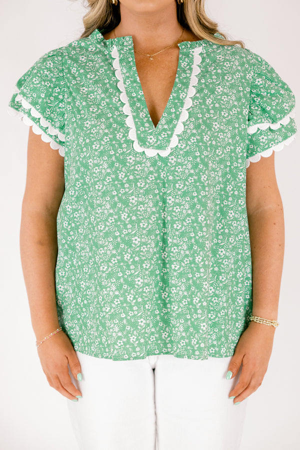 Chic Soul plus size clothing, green and white floral print short sleeve top with white scallop trim along the bottom of the sleeves and bordering the v-neckline