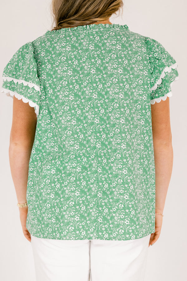 Chic Soul plus size clothing, green and white floral print short sleeve top with white scallop trim along the bottom of the sleeves and bordering the v-neckline