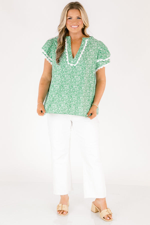 Chic Soul plus size clothing, green and white floral print short sleeve top with white scallop trim along the bottom of the sleeves and bordering the v-neckline