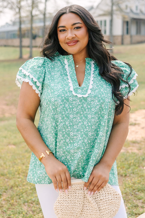 Chic Soul plus size clothing, green and white floral print short sleeve top with white scallop trim along the bottom of the sleeves and bordering the v-neckline