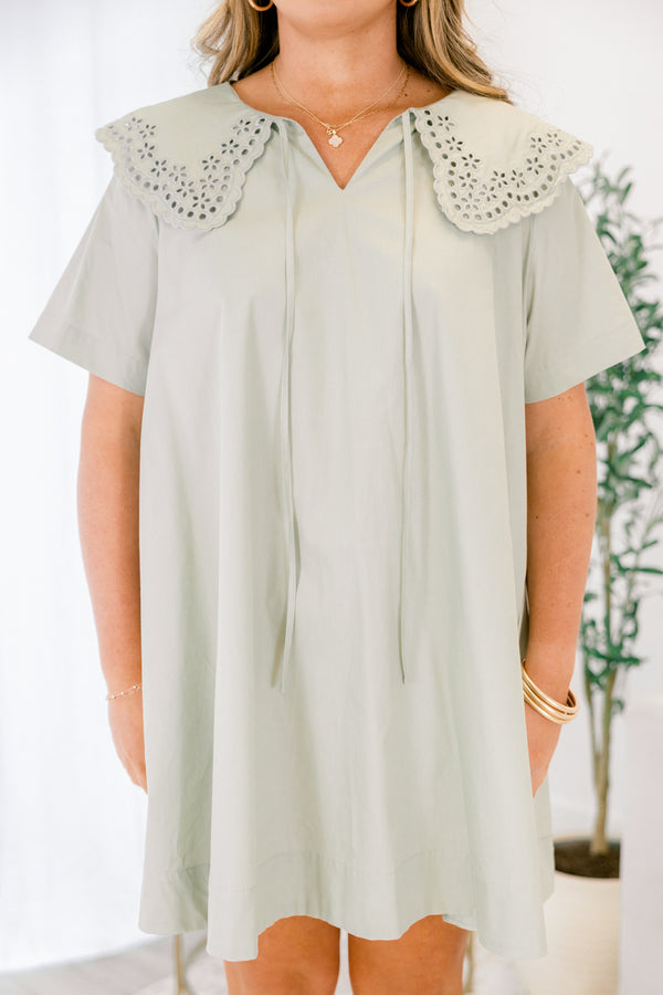 Chic Soul plus size clothing, Sage knee length dress featuring an eyelet-detailed bib on top of the shoulder area and a slight V-neckline. 
