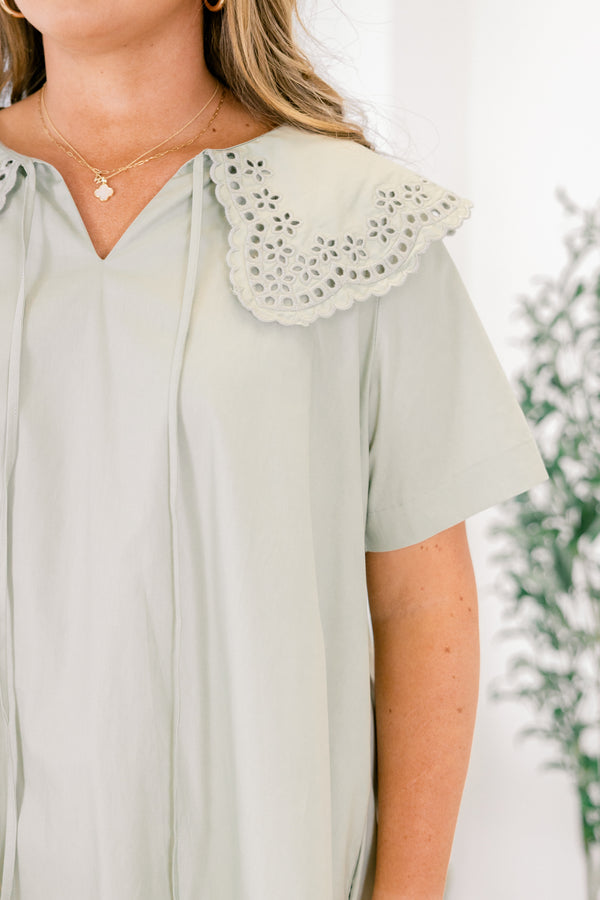 Chic Soul plus size clothing, Sage knee length dress featuring an eyelet-detailed bib on top of the shoulder area and a slight V-neckline. 
