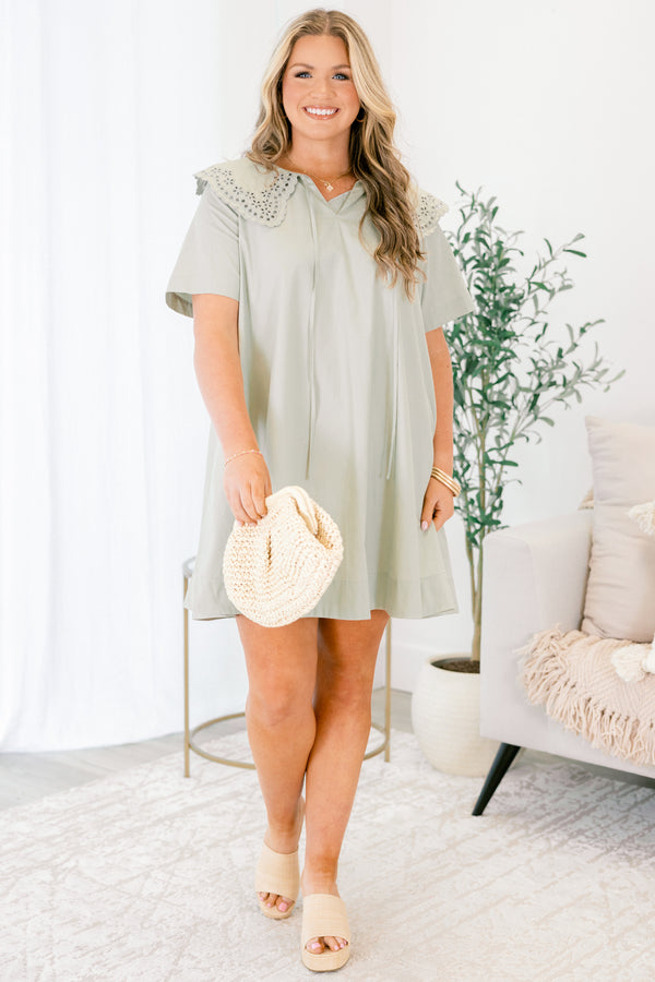 Chic Soul plus size clothing, Sage knee length dress featuring an eyelet-detailed bib on top of the shoulder area and a slight V-neckline. 
