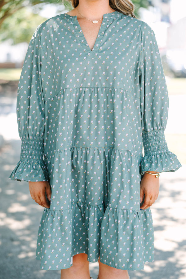 Plus Size green babydoll dress with a split v-neck, mini bell sleeves, and a floral polka dot print.