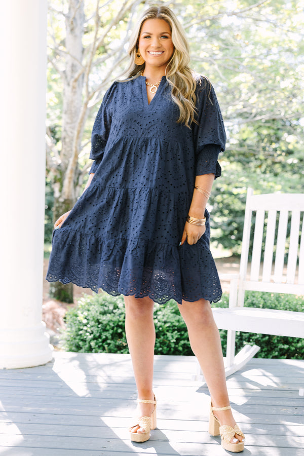 Chic Soul plus size clothing, navy mid sleeve short dress with eyelet design throughout the dress, tiered skirt, v-neckline, and cinching on the bottom of the sleeves