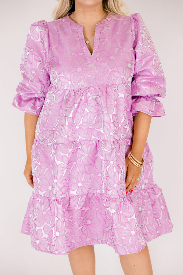 Chic Soul plus size clothing, periwinkle tiered knee length dress with half sleeves that have a ruffle detail at he end of each sleeve as well as a floral pattern 