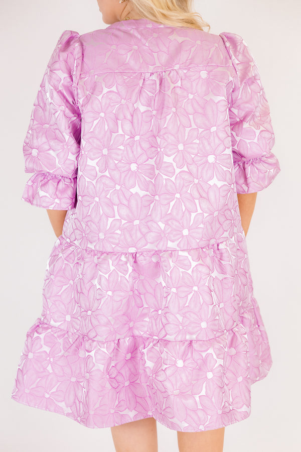 Chic Soul plus size clothing, periwinkle tiered knee length dress with half sleeves that have a ruffle detail at he end of each sleeve as well as a floral pattern 
