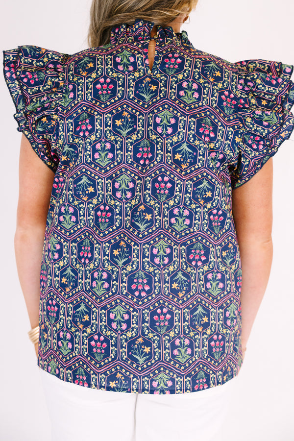 Chic Soul plus size clothing, navy blue top with flutter sleeves and a floral block pattern throughout 